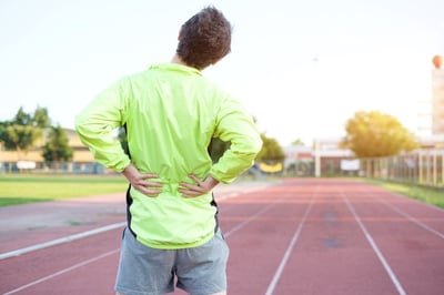 Athlete experiencing back pain