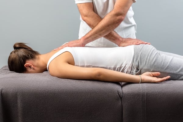 Chiropractor Adjusting Woman in Inverness, FL