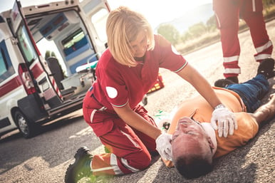 Man being treated after an auto accident in Gainesville, Georgia